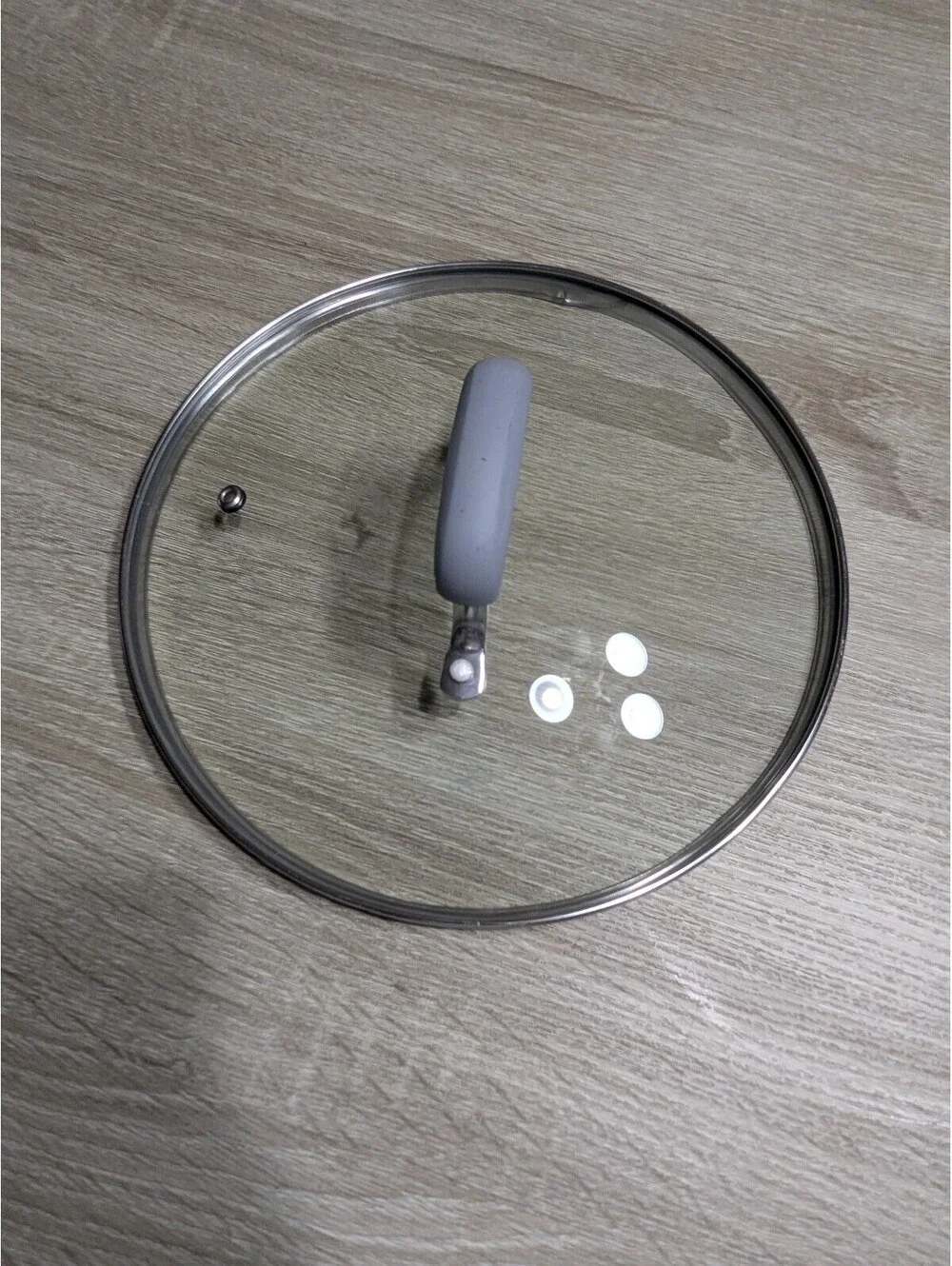 10-Inch Glass Pot Lid with Gray Silicone Handle and Steam Vent